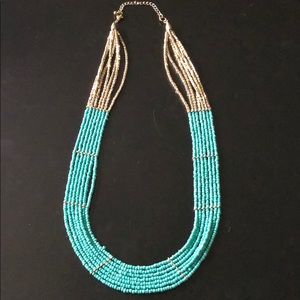 Turquoise and gold statement necklace